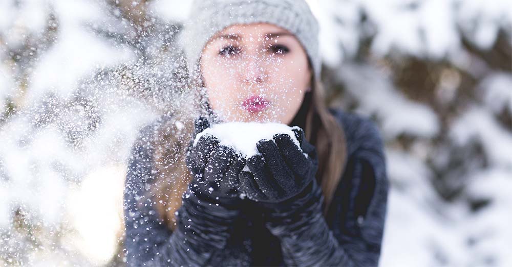 Girl playing in snow